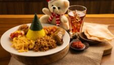 Sepiring nasi kuning hangat dengan beragam lauk pauk seperti ayam goreng, telur iris, dan serundeng, siap memanjakan lidah para penikmat kuliner. Hidangan ikonik ini mencerminkan kekayaan budaya dan tradisi kuliner Indonesia yang tak lekang oleh waktu.