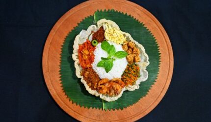 Nasi Kuning: Jejak Aroma Rempah Nusantara di Setiap Sudut Meja