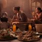 Seorang tetua adat Dayak dengan cekatan meracik ramuan herbal tradisional yang diwariskan turun-temurun, menunjukkan keahlian dan kearifan dalam memanfaatkan kekayaan alam Kalimantan.